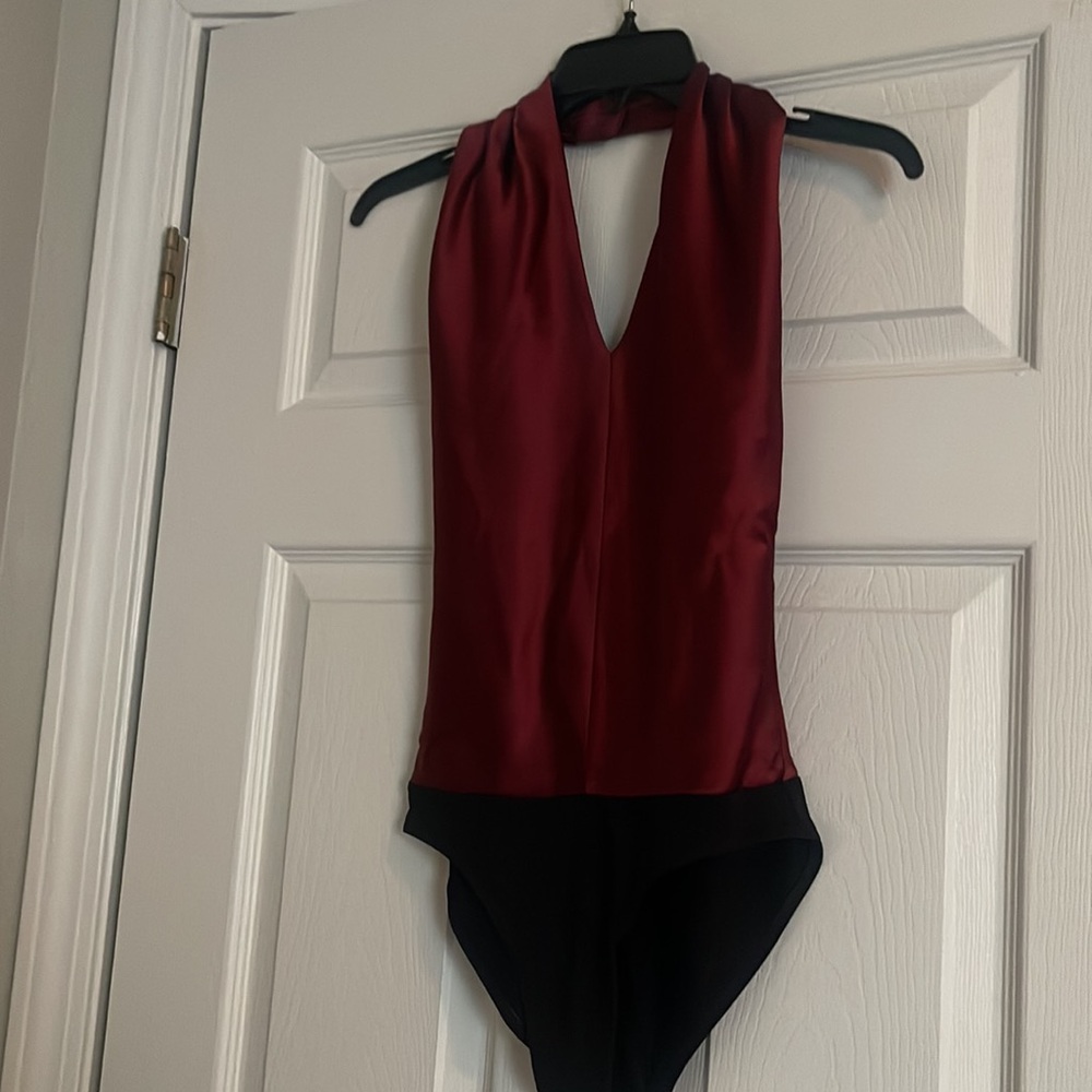 Beautiful burgundy bodysuit with black bottom and the back is open!!!